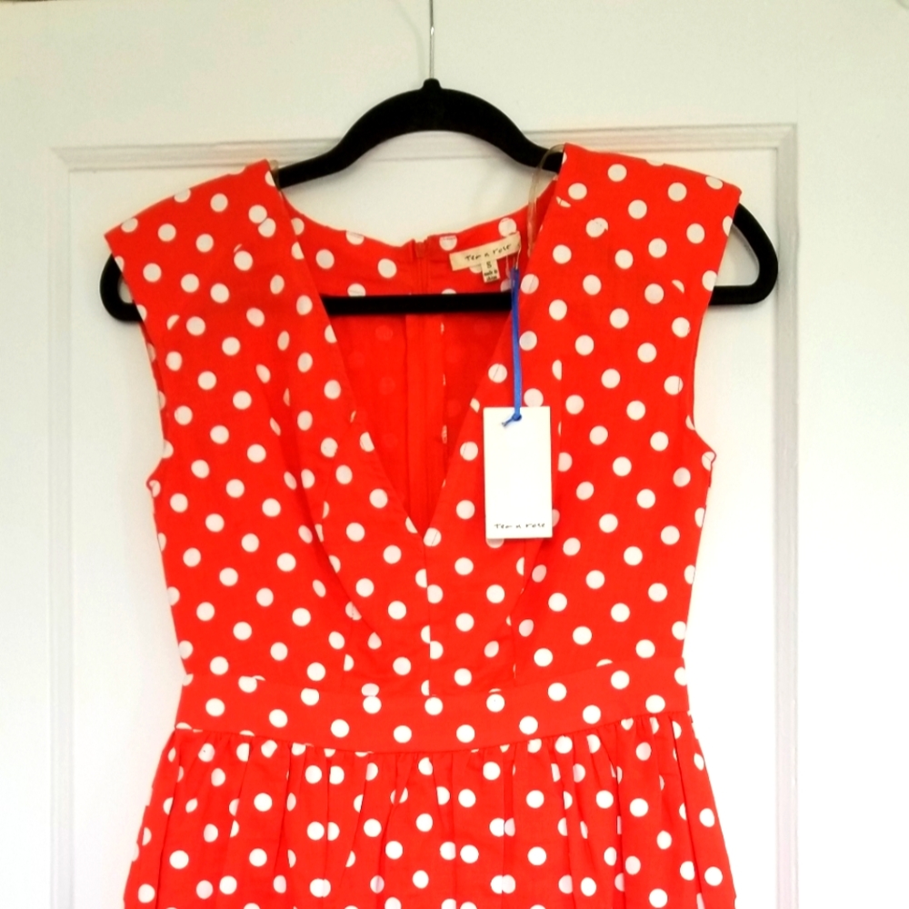 Tea and Rose orange and white polka dot tea length dress.